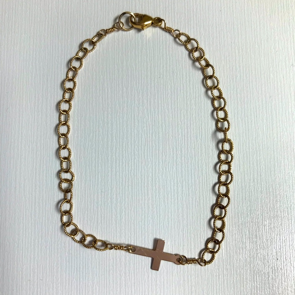 Gold cross bracelet